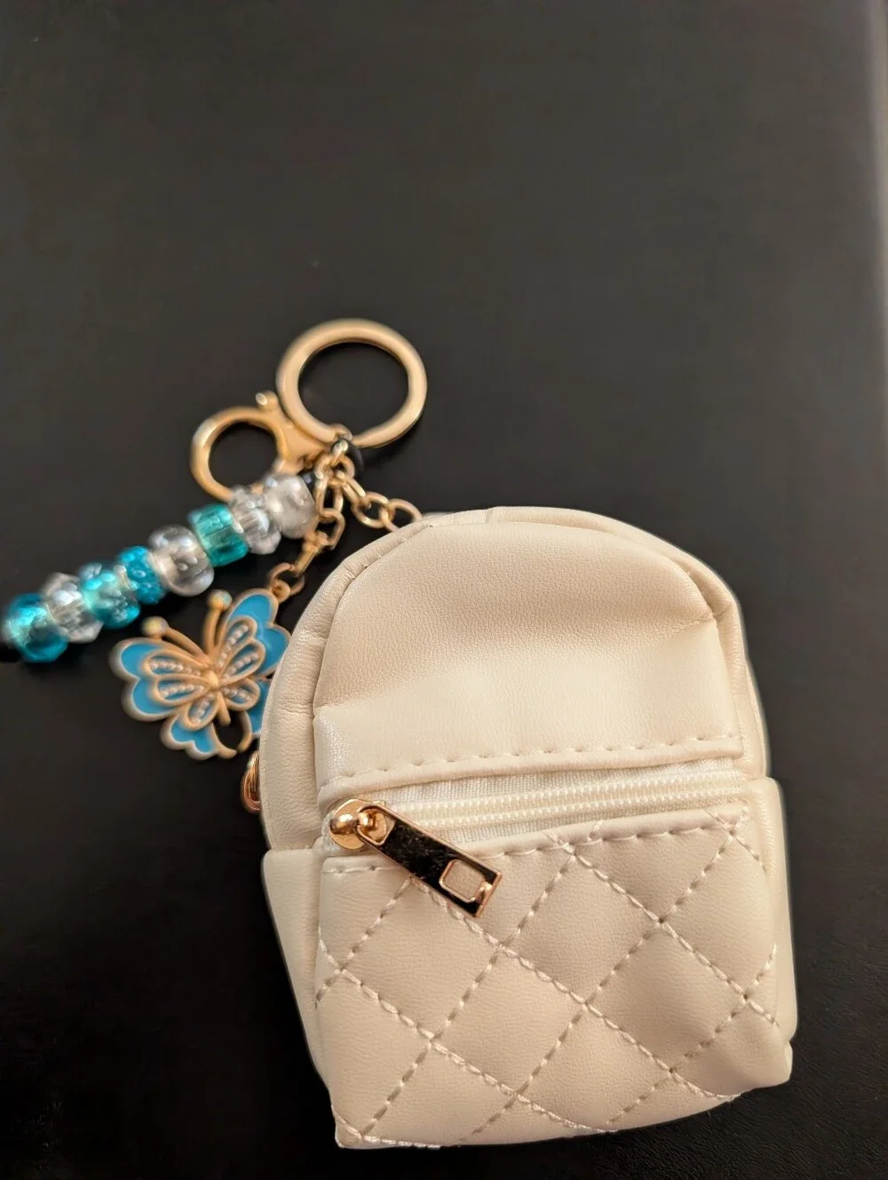 Mini Quilted Cream Backpack Keychain with Blue Butterfly Charm
